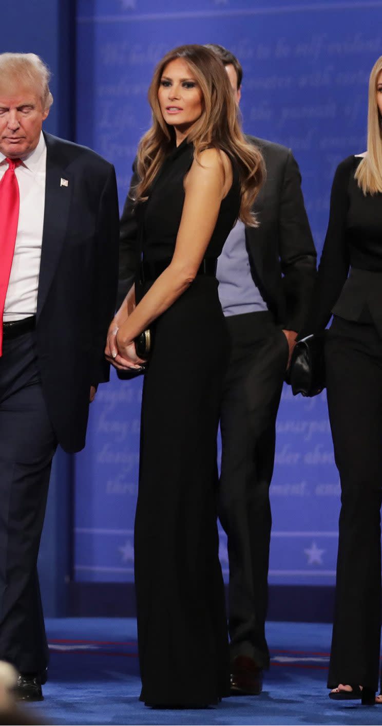 First Lady Melania Trump wears a black Ralph Lauren jumpsuit during a debate. (Photo: Getty Images)