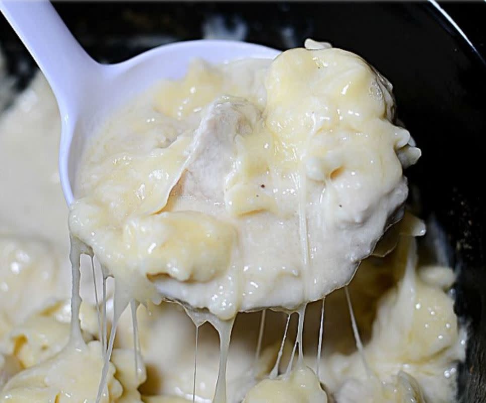 <p>Dancing Through The Rain</p><p>The perfect filling dinner is born when tortellini partners with chicken Alfredo. </p><p><strong>Get the recipe: <a href="https://dancingthroughtherain.com/slow-cooker-chicken-alfredo-tortellini" rel="nofollow noopener" target="_blank" data-ylk="slk:Slow Cooker Chicken Alfredo Tortellini;elm:context_link;itc:0;sec:content-canvas" class="link rapid-noclick-resp">Slow Cooker Chicken Alfredo Tortellini</a></strong></p>