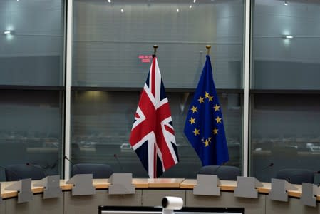 British Union Jack and EU flags are pictured before the meeting with Britain's Brexit Secretary Barclay and EU's chief Brexit negotiator Barnier in Brussels