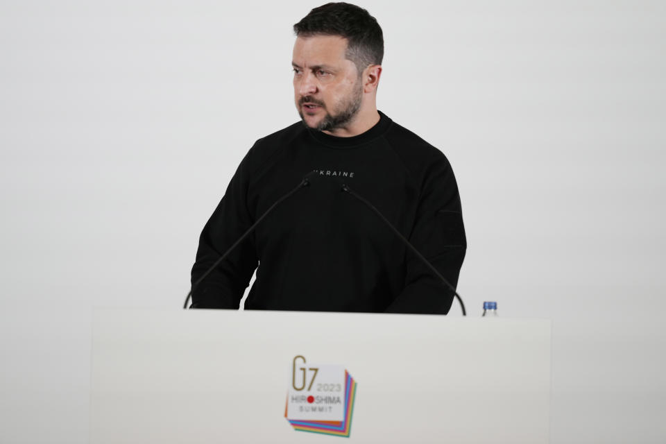 Ukrainian President Volodymyr Zelenskyy speaks during a news conference at the Group of Seven nations' summit in Hiroshima, western Japan, Sunday, May 21, 2023. (AP Photo/Louise Delmotte, Pool)