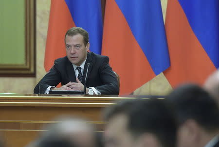 Russian Prime Minister Dmitry Medvedev chairs a meeting with government members and other officials in Moscow, Russia, December 1, 2015. REUTERS/Alexander Astafyev/Sputnik/Pool