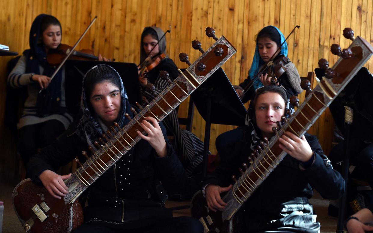 Centuries of tradition: Afghan women rehearse in Kabul in 2017 - AFP/Getty Images
