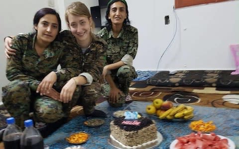 Chapman with YPJ fighters stationed in northern Syria - Credit: YPJ