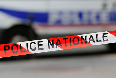 Red and white tape used by the French national police secures a zone from traffic in Paris, France, October 19, 2016. REUTERS/Regis Duvignau