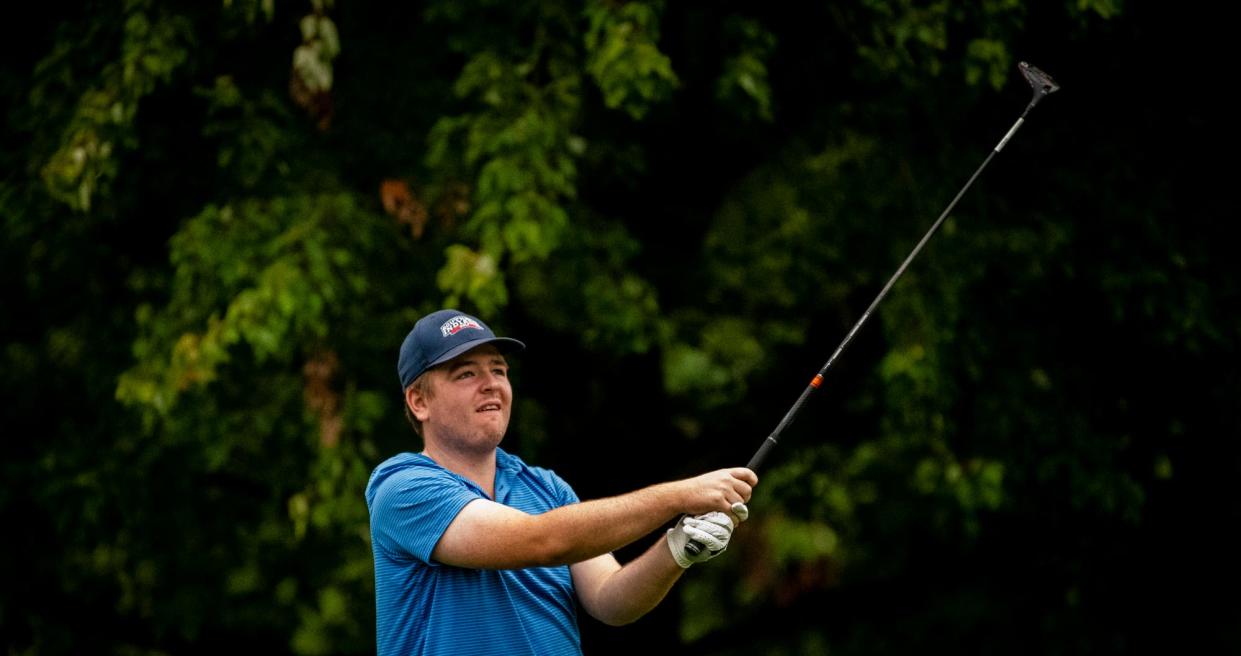 Jace Day watches his tee shot during the second day of match play for the Bloomington City Golf Tournament at Cascades Golf Course on Sunday, July 11, 2021.