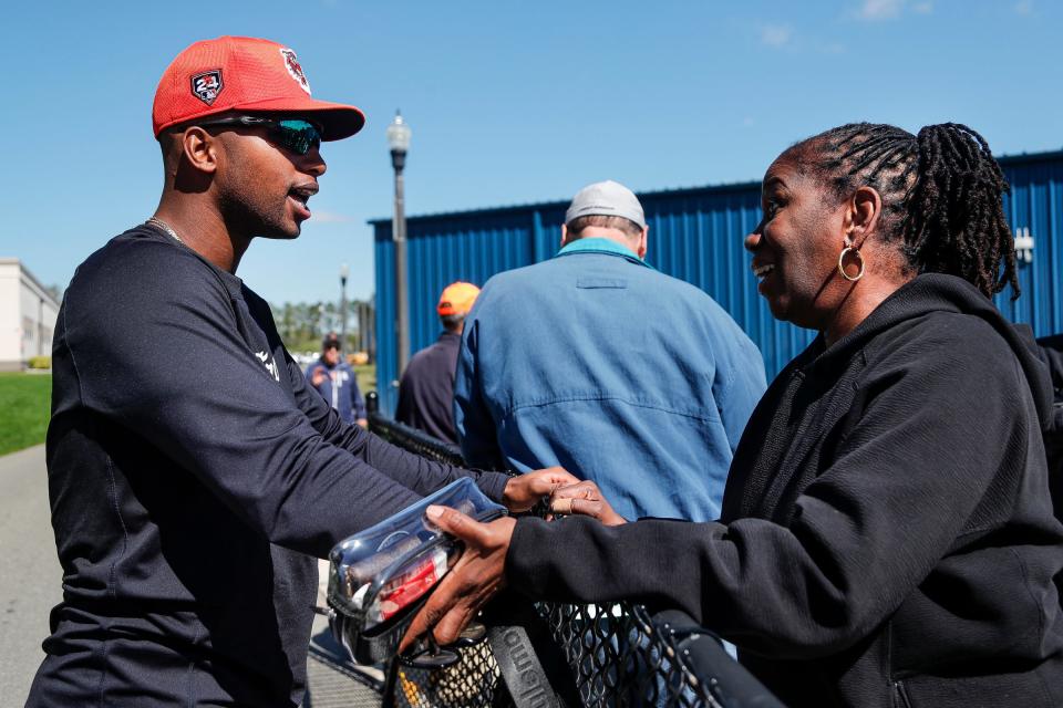 Detroit Tigers outfielder Justyn-Henry Malloy talks to his mother Jacqueline Malloy, who flew in to surprise him for his 24th birthday during spring training at TigerTown in Lakeland, Fla. on Monday, Feb. 19, 2024.