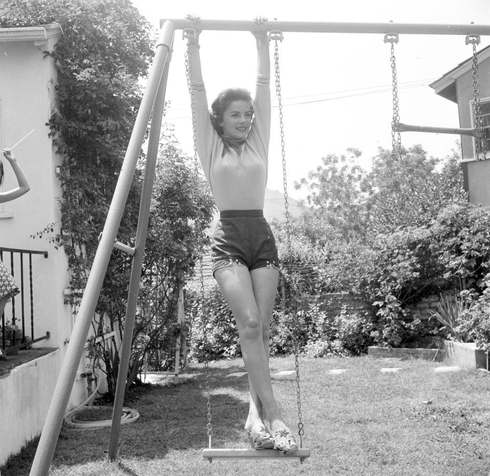 Natalie Wood poses for a portrait at home in Los Angeles, circa 1955.