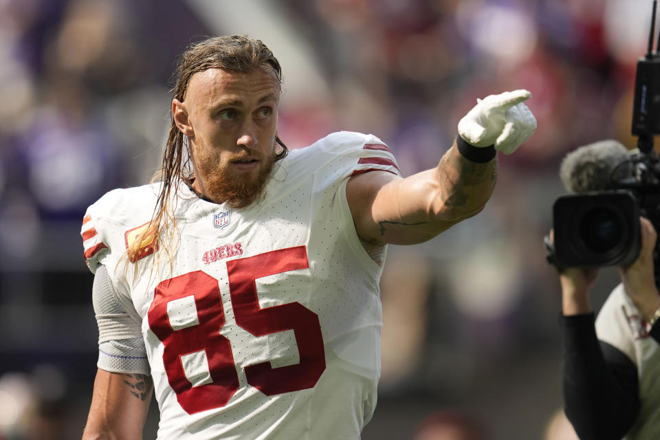 San Francisco 49ers tight end George Kittle (85) reacts to fans before an NFL football game against the Minnesota Vikings, Sunday, Sept. 15, 2024, in Minneapolis. (AP Photo/Abbie Parr)