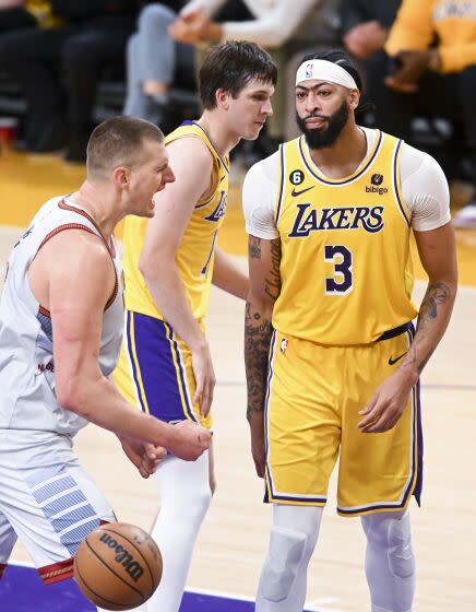 LOS ANGELES, CA - MAY 22: Los Angeles Lakers forward Anthony Davis, right, reacts after a shot made.