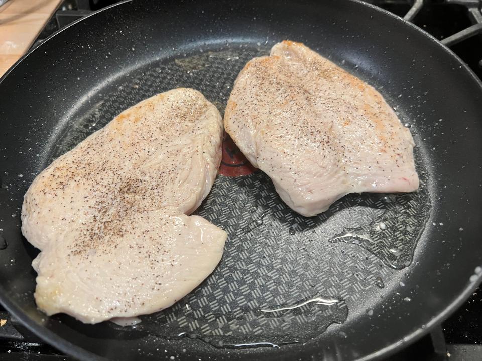 Chicken breasts in pan