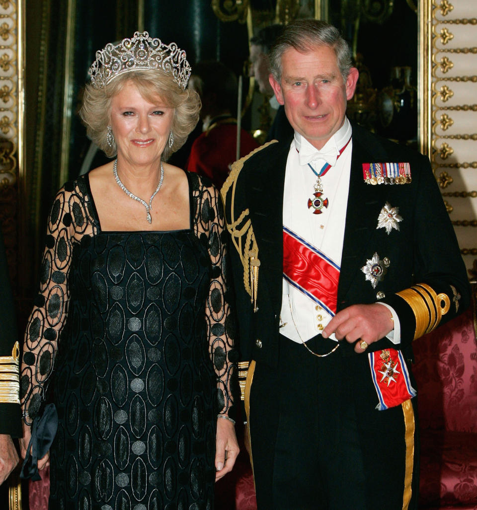 Camilla Duchess of Cornwall arrives in Royal heirloom diamond tiara, necklace and earrings, with Prince Charles The Prince of Wales at a banquet in Buckingham Palace on October 25, 2005 in London, England.