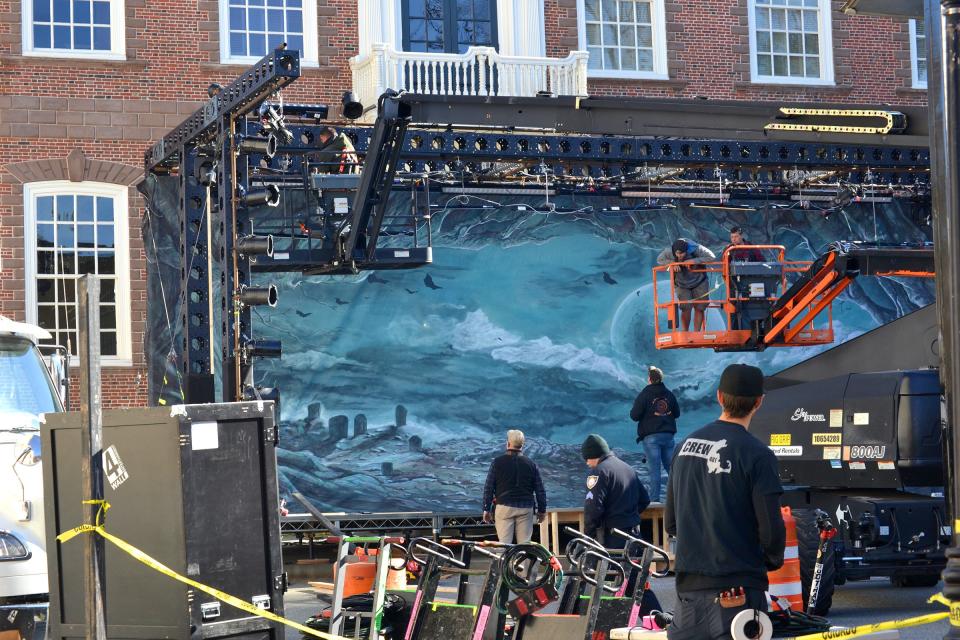 Crew members on the 'Hocus Pocus 2' set prepare for filming of the sequel in front of the Old Colony House in Newport.