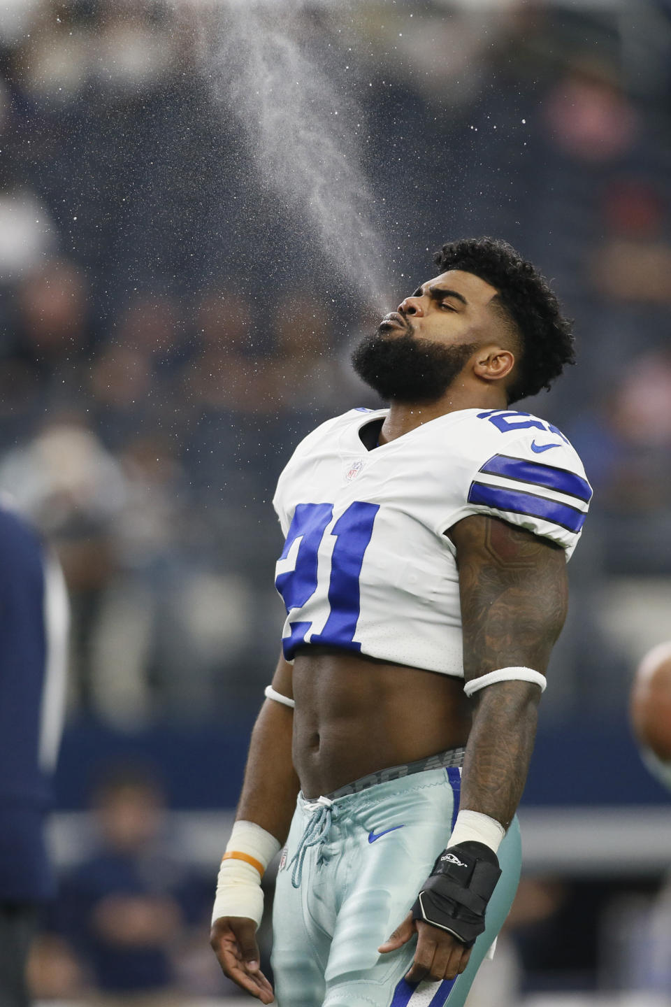 <p>Dallas Cowboys running back Ezekiel Elliott (21) on the field before the game against the Los Angeles Rams at AT&T Stadium. Mandatory Credit: Tim Heitman-USA TODAY Sports </p>