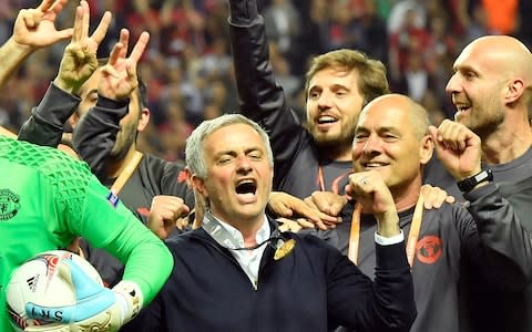 Jose Mourinho celebrates winning the Europa League - Credit: AP