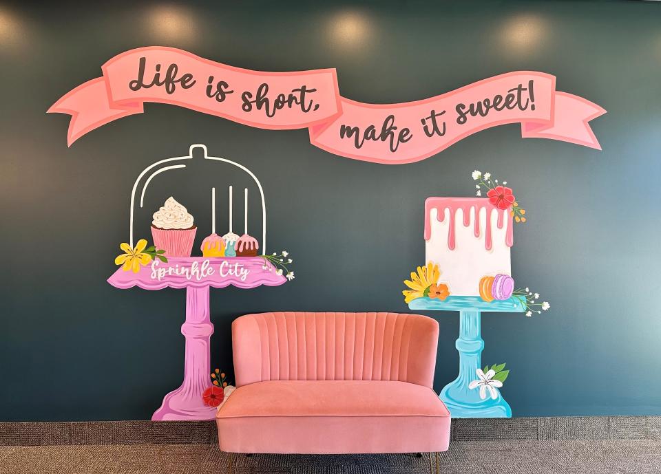A wall inside Sprinkle City Bakery in North Canton declares "Life is short, make it sweet."