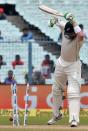 Cricket - India v New Zealand - Second Test cricket match - Eden Gardens, Kolkata - 01/10/2016. New Zealand's Martin Guptill is bowled out by India's Bhuvneshwar Kumar. REUTERS/Rupak De Chowdhuri