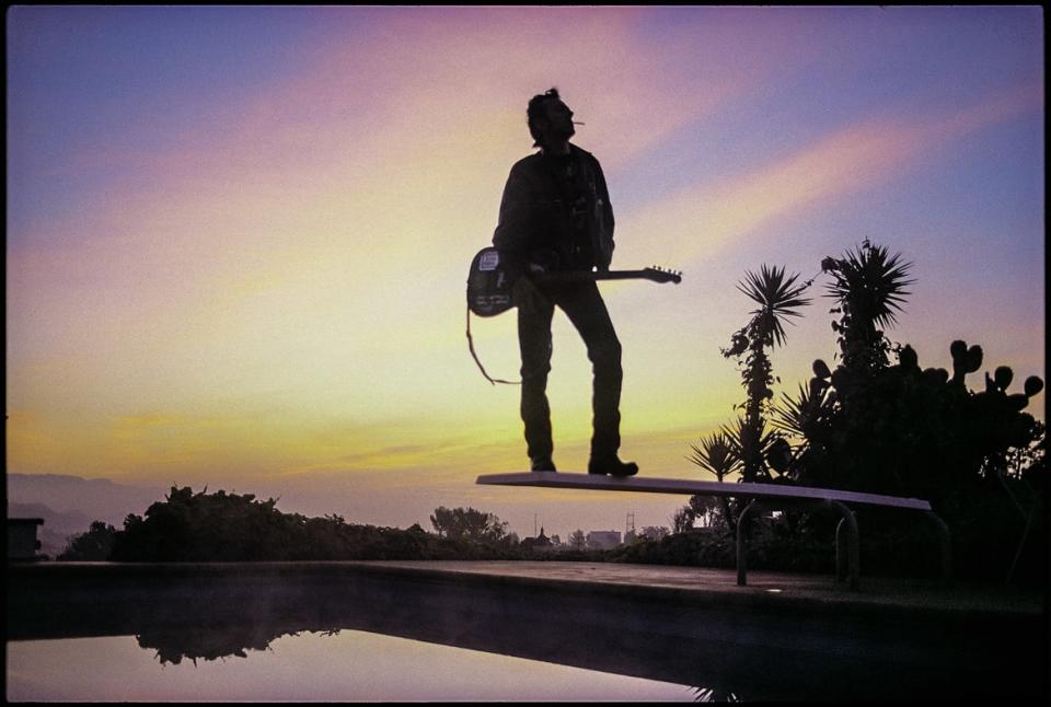 <div class="inline-image__caption"><p>Joe Strummer at Lookout Mountain, Los Angeles. 1989. </p></div> <div class="inline-image__credit">Josh Cheuse</div>