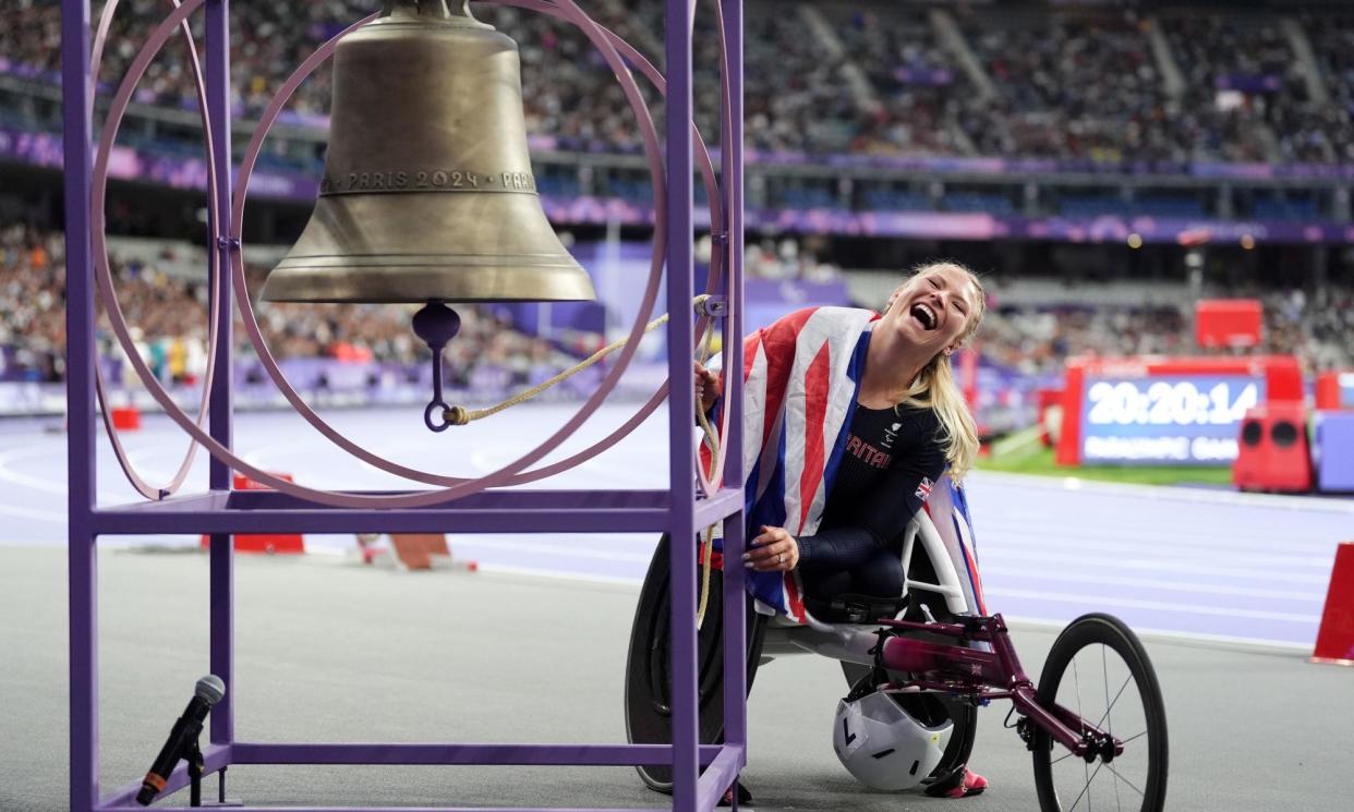 <span>Sammi Kinghorn celebrates after winning the women’s T53 100m final at the Stade de France.</span><span>Photograph: Adam Davy/PA</span>