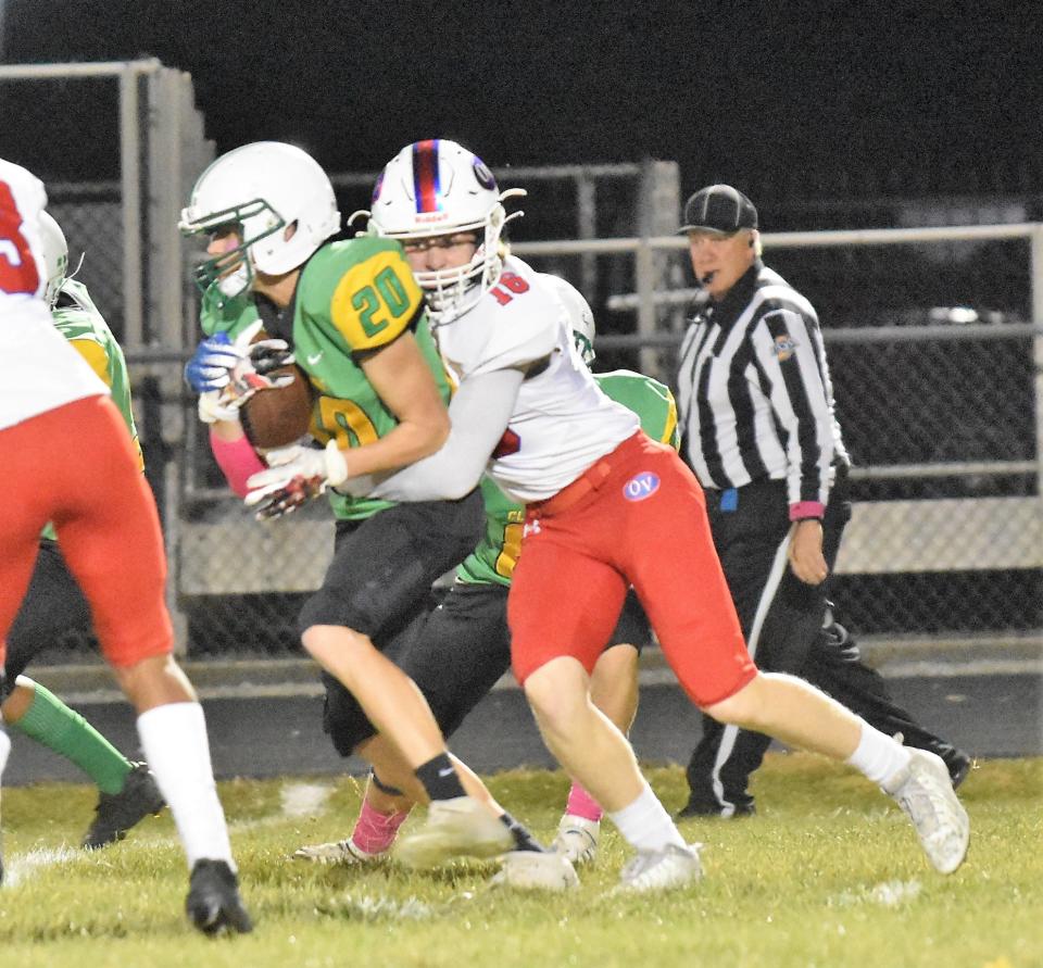 Junior Jack DuBois makes the tackle for the Patriots.