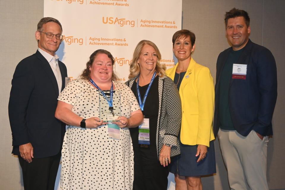 Ohio District 5 Area Agency on Aging CEO Duana Patton (center) and a community care specialist were on hand to receive the Aging Innovations Award during the USAging National Conference in Salt Lake City.