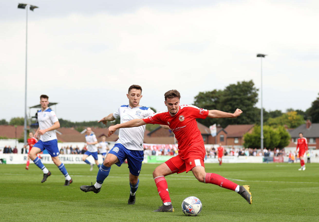 RADCLIFFE, ENGLAND - SEPTEMBER 03: Brad Hird of North Shields shoots during the The Emirates FA Cup First Round Qualifying match between Bury AFC and North Shields on September 03, 2022 in Radcliffe, England. (Photo by Lewis Storey/Getty Images)