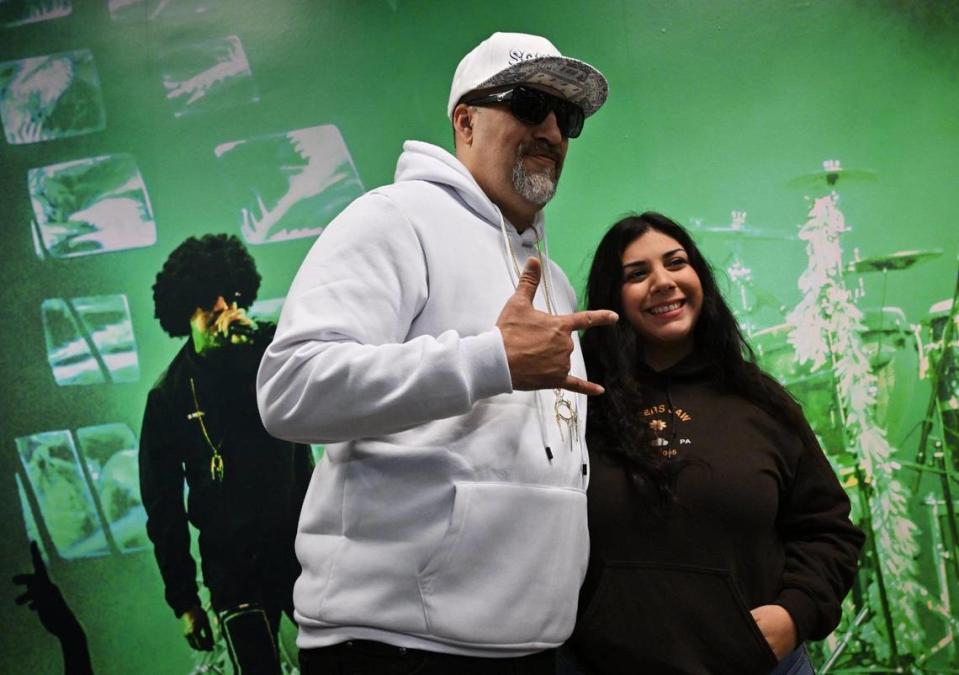 Hip hop group’s B-Real, left, poses with a fan at the grand opening for Dr. Greenthumbs, Fresno newest cannabis dispensary, Saturday morning, April 6, 2024 in Fresno.