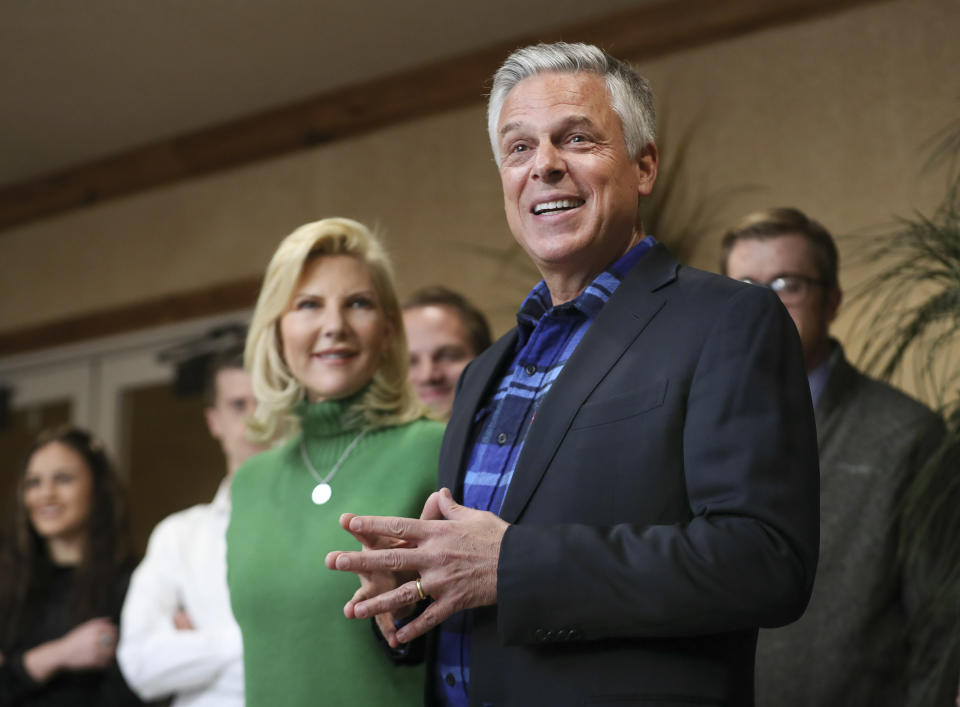 Jon Huntsman Jr. and his wife Mary Kaye talk with employees and clients at KKOS Lawyers and K&E CPAs in their offices in Cedar City, Utah, shortly after announcing that he is running for a third term as Utah's governor Thursday, Nov. 14, 2019. (Steve Griffin/The Deseret News via AP)