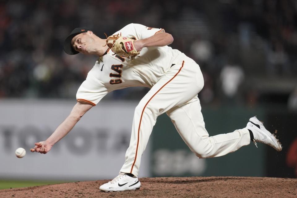 Tyler Rogers, pitching against the Brewers on Sept. 1, is an important member of the Giants' bullpen.