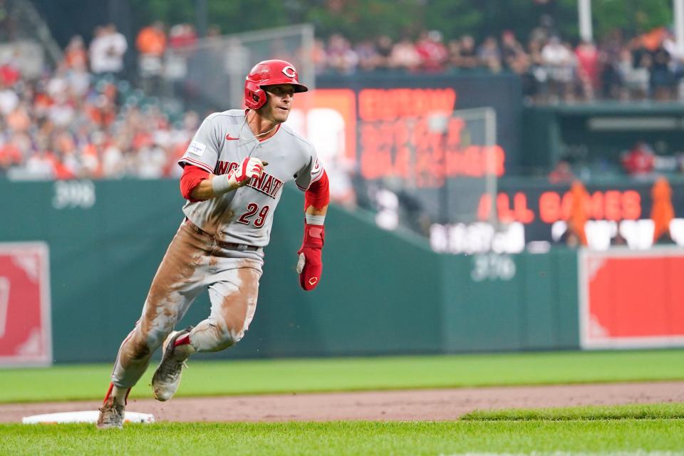 Reds leadoff man TJ Friedl scores the first run Wednesday and later hit a 10th-inning home run in a win over the Baltimore Orioles