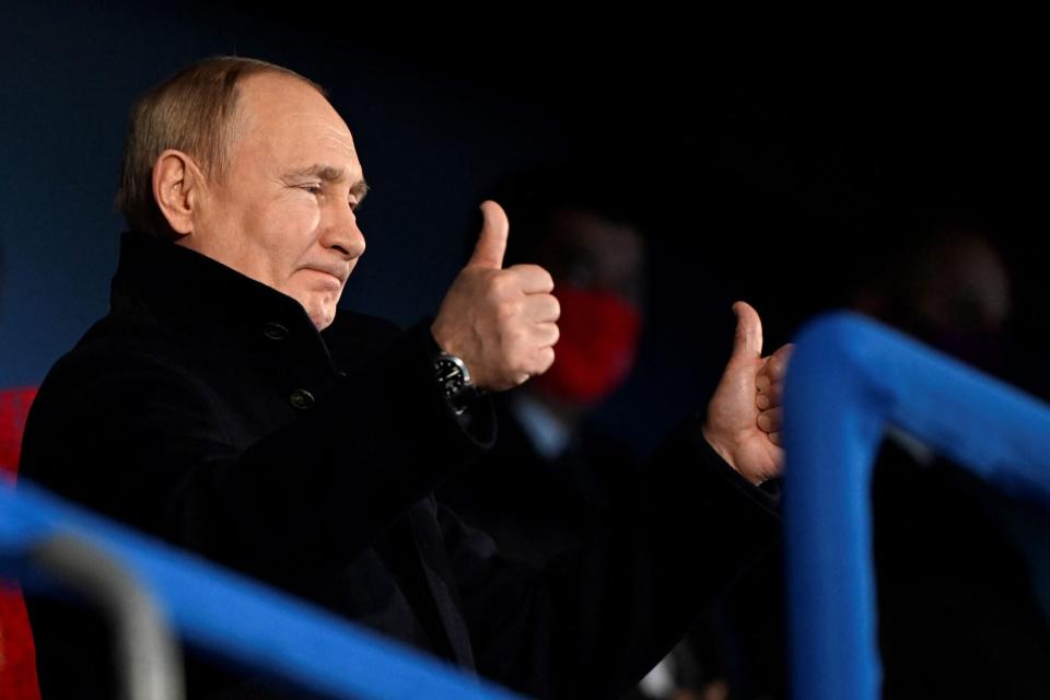 Russia's President Vladimir Putin gestures during the opening ceremony of the Beijing 2022 Winter Olympic Games