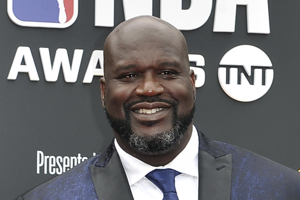 FILE - This June 24, 2019, file photo shows Shaquille O'Neal at the NBA Awards in Santa Monica, Calif. A woman whose car was left stranded along a Florida interstate when her tire blew out got a little unexpected help from former NBA star Shaquille O'Neal, sheriff's officials say. O'Neal, who lives in the Orlando area, was traveling on Interstate 75 near Gainesville on Monday, July 13, 2020, when he saw the woman pull onto the side of the road, the Alachua County Sheriff’s Office said on a Facebook post. He stayed with the woman until deputies arrived at the scene. “He fist-bumped Deputies Purington and Dillon before going on his way,” the sheriff’s office wrote on Facebook. (Photo by Richard Shotwell/Invision/AP, File)