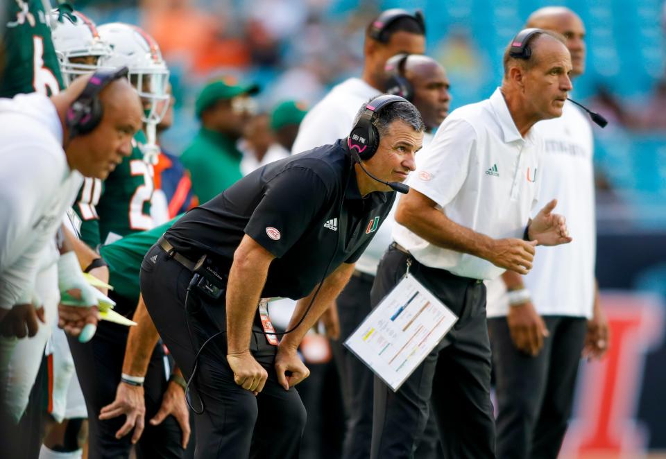 Miami coach Mario Cristobal looks on during the Hurricanes' loss to Duke.