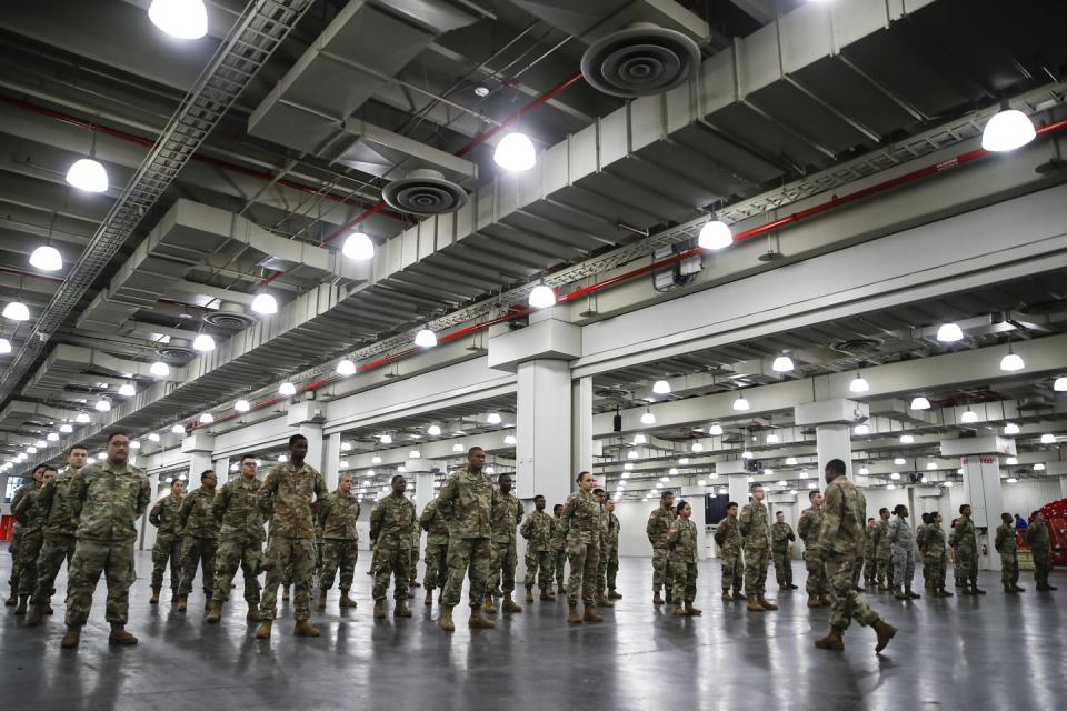 <span class="caption">The National Guard in New York to respond to COVID-19.</span> <span class="attribution"><a class="link " href="http://www.apimages.com/metadata/Index/Virus-Outbreak-New-York/bd8de538985348b397cd235e84529407/81/1" rel="nofollow noopener" target="_blank" data-ylk="slk:AP Photo/John Minchillo;elm:context_link;itc:0;sec:content-canvas">AP Photo/John Minchillo</a></span>