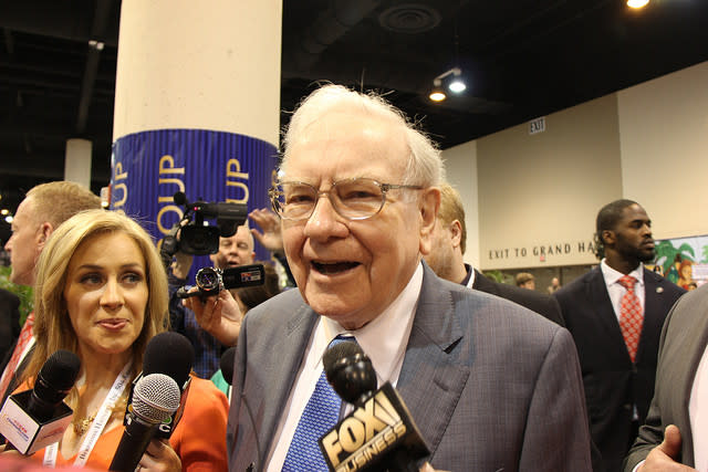 Warren Buffett talks to the media.