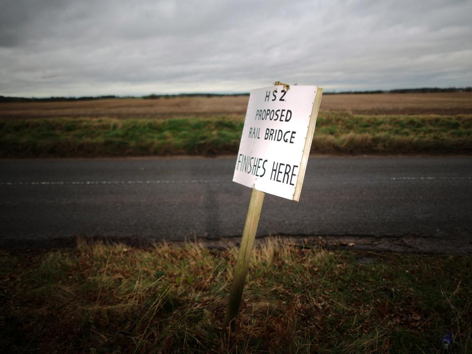 MIDDLETON, ENGLAND - JANUARY 29: A sign erected by protesters marks the spot where a new rail bridge is proposed to be built across the countryside for the new HS2 high speed train link at the village of Middleton in Staffordshire on January 29, 2013 in Middleton near Tamworth, England.