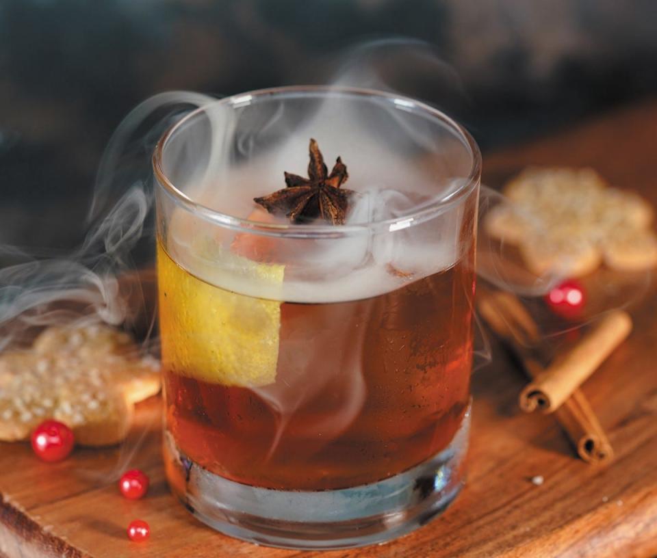 A Fireside Old Fashioned holiday cocktail is served at 1000 North restaurant in Jupiter.