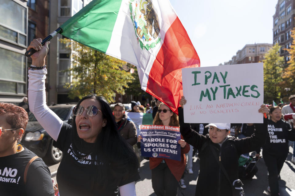 Immigrants who have been in U.S. for years, march to The White House asking for work permits for Deferred Action for Childhood Arrivals (DACA), and Temporary Protected Status (TPS), programs in Washington, Tuesday, Nov. 14, 2023. (AP Photo/Jose Luis Magana)