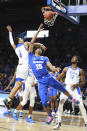Memphis guard Jayden Hardaway (25) is fouled by Tulsa guard Isaiah Hill (4) in the first half of an NCAA college basketball game in Tulsa, Okla., Wednesday, Jan. 22, 2020. (AP Photo/Joey Johnson)