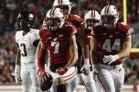 Wisconsin's Danny Davis III reacts after a catch for a first down during the first half of an NCAA college football game against Army Saturday, Oct. 16, 2021, in Madison, Wis. (AP Photo/Morry Gash)