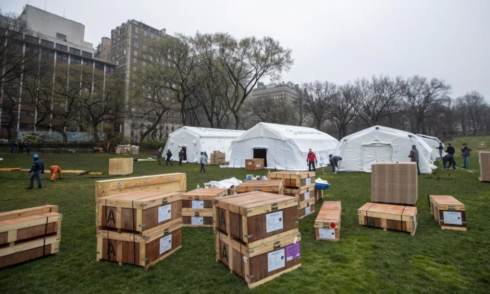 An emergency field hospital equipped with a respiratory unit goes up outside Mount Sinai hospital in New York’s Central Park.