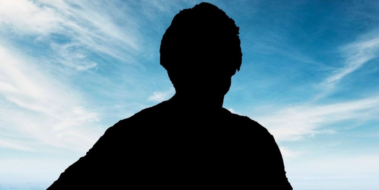 male silhouette on a beach background