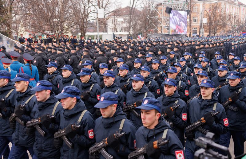 Police march during parade celebrations to mark their autonomous Serb Republic's national holiday, in Banja Luka