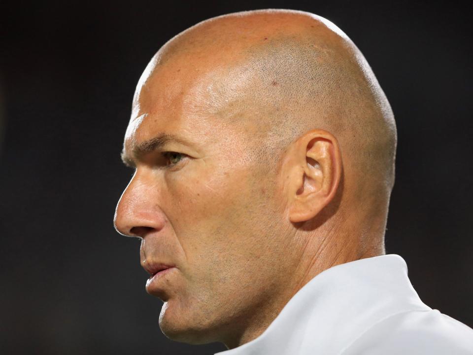 Zidane led Madrid to a domestic and European double last season: Getty Images