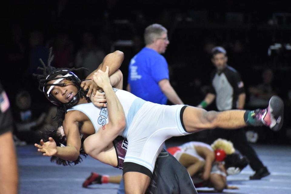 Arlington Seguin’s E’Shawn Tolbert competes in the UIL state wrestling championships in Cypress, Texas on Feb. 17, 2024.