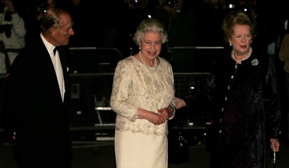 Former British Prime Minister Baroness Margaret Thatcher (R) greets HM Queen Elizabeth II and Prince Philip, Duke of Edinburgh, as they arrive for Thatcher's 80th birthday party at the Mandarin Oriental on October 13, 2005 (Getty Images)