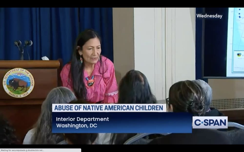 Interior Secretary Deb Haaland speaks with attendees at the May 11, 2022 press conference announcing the findings of the Interior’s investigative report into Indian boarding schools. (Photo: C-SPAN Screenshot) 