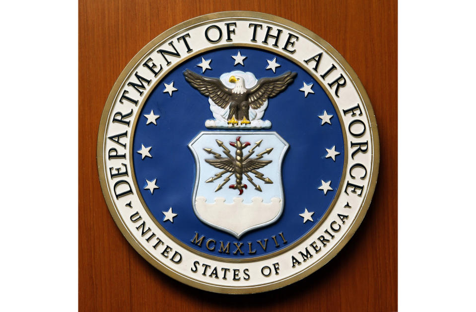 FILE - This Friday, Aug. 10, 2007, file photo, shows the logo of the Department of the U.S. Air Force at the United Staes embassy, in Berlin. A new report issued Monday, Dec. 21, 2020, on racial disparities in the Air Force concludes that Black service members in the service are far more likely to be investigated, arrested, face disciplinary actions, and be discharged for misconduct. (AP Photo/Michael Sohn, File)