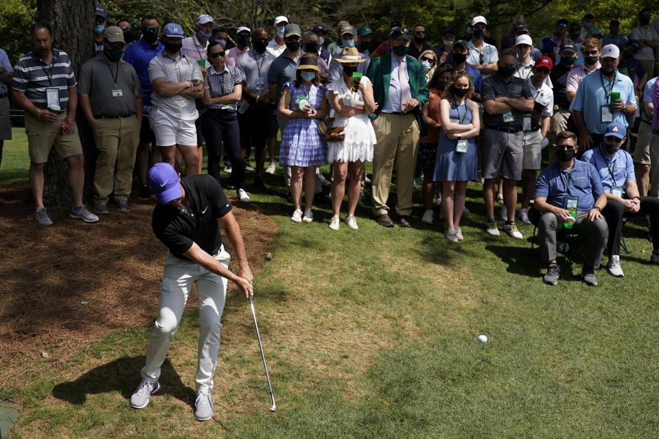 Rory McIlroy, of Northern Ireland hits out of the rough on the sixth hole during the first round of the Masters golf tournament on Thursday, April 8, 2021, in Augusta, Ga. (AP Photo/Charlie Riedel)