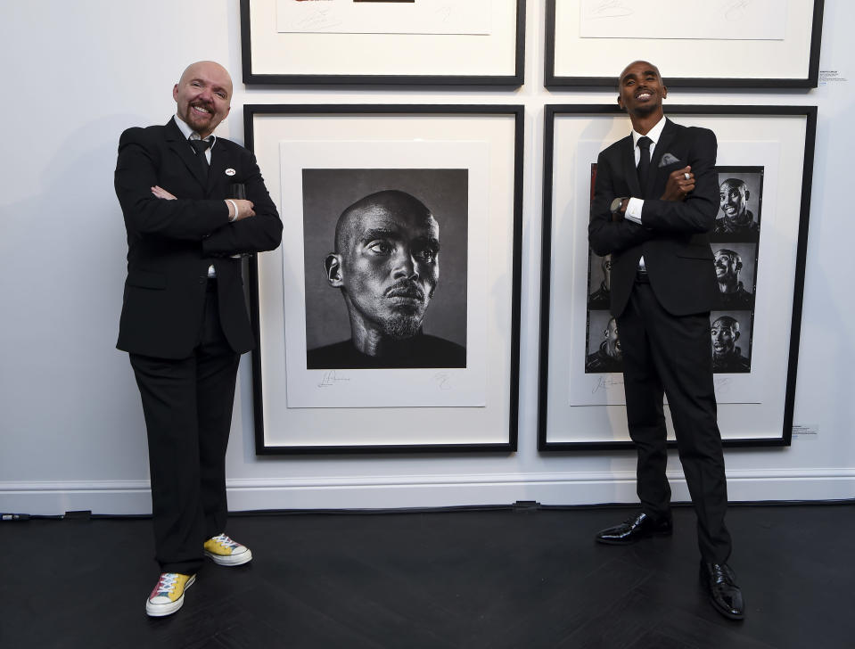 Andy Gotts with Sir Mo Farah by his portrait at the launch of Faces Of Soccer Aid' (Daniel Hambury/Unicef/Soccer Aid Productions/Stella Pictures/PA)