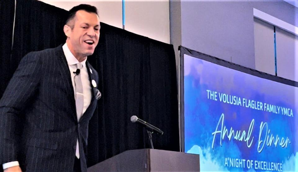 Chris Seilkop, CEO of the Volusia Flagler Family YMCA, addresses the more than 200 people who attended the nonprofit's annual dinner at the Hard Rock Hotel in Daytona Beach on Monday evening, March 13, 2023. It was the first in-person annual dinner the regional Y has held since before the start of the COVID-19 pandemic.